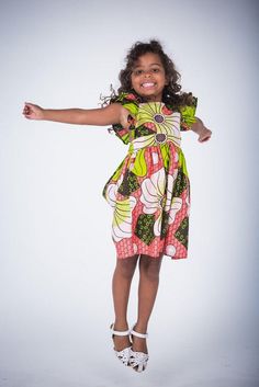 Playful Green Dress For Dress-up, Whimsical Multicolor Short Sleeve Dress, Fun Green Short Sleeve Dress, Fun Green Short-sleeved Dresses, Whimsical Multicolor Cotton Dress, Playful Green Sundress For Playtime, Green Fun Dresses With Ruffles, Pinny Dress, African Print Dress