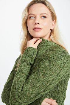 Sophisticated, comforting and flattering beyond measure. The Listowel Aran Cabled Sweater is a true gem within the Aran Woollen Mills collection. This piece celebrates the cable stitch by showcasing numerous styles to include a chunky look, elongated cables and the ever-traditional trellis. Though this knit stays true to the Aran tradition, the neat raglan sleeve and gentle side fitting allows it to capture a beautiful silhouette and remain up to the minute with modern styling. The perfect piece Luxury Socks, Wool Accessories, Aran Sweater, Cable Stitch, Summer Sweaters, Cable Sweater, Shawls And Wraps, Knitted Pullover, Sweater Shop