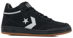 a black and white sneaker with a star on the side, in front of a white background