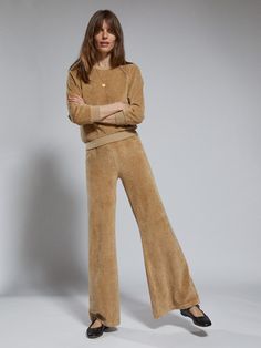 Perfectly proportioned, the relaxed fit is finished with a wide leg flourish, a high waist and exaggerated ankle detailing. Crafted in velour. | Suzie Kondi Zephyra Flare Pants in Velour | Wheat Heather | Women's X-Small Chic Wide Leg Pants For Elevated Casual Occasion, Chic Wide-leg Pants For Elevated Casual Occasions, Elevated Casual Fall Wide-leg Pants, Elevated Casual Wide-leg Pants For Fall, Chic Wide-leg Casual Pants, Chic Full Length Bottoms For Elevated Casual Occasion, Wide Leg Pants For Elevated Casual Wear, Chic Full Length Bottoms For Elevated Casual Look, Fall Wide Leg Elevated Casual Sweatpants