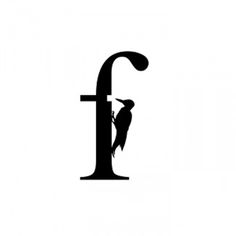 a black and white image of a bird perched on the letter f