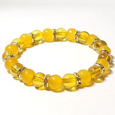 Sunny Days Ahead Glass Beaded Stretch Bracelet 8mm Opaque & Transparent Yellow Glass Beads Yellow Rhinestone Rondelles Handmade By Me 7" Length New If You Want A Different Size Or Color Scheme, Please Let Me Know, I Can Customize For You. Yellow Bead Bracelet Ideas, Yellow Glass Bead Bracelet, Yellow Bracelet Ideas, Yellow Beaded Bracelets, Yellow Bead Bracelet, Pulseras Aesthetic, Stained Glass Necklace, Gemstone Wrap Bracelet, Handmade Crystal Necklace