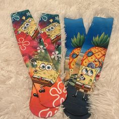 two pairs of spongebob socks with pineapples and other cartoon characters on them