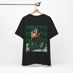 Ferxxo / FeidCalipsis  t-shirt Cool Short Sleeve T-shirt With Graphic Print, Hip Hop Short Sleeve T-shirt For Music Festivals, Urban Style Concert T-shirt With Screen Print, Fan Merchandise T-shirt For Music Festivals, Hip Hop Graphic T-shirt For Concerts, Trendy Streetwear Shirt With Front Print, Trendy Front Print Shirt For Streetwear, Cool Graphic T-shirt For Streetwear, Edgy Streetwear Top For Music Festivals