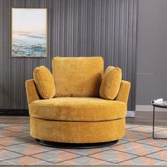 a yellow chair sitting on top of a rug