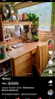 an instagram page on the mobile phone shows someone's bedroom with plants and other things