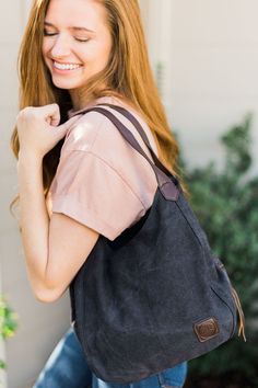 our anniston hobo bag is as cute as it is functional. the slouchy look pairs perfectly with some amazing qualities to help you store and easily access all of your daily essentials. it comes with two magnetic-snap compartments on top on each side of the main zipper-enclosed compartment. this makes it a breeze to throw in your phone or keys that you might need quick and easy access to, while still being able to zip up your wallet or cash in a more concealed and safe compartment. you're going to lo Trendy Hobo Bag With Pockets For On-the-go, Trendy Hobo Bag With Pockets For Everyday Use, Everyday Use Hobo Tote Bag With Pockets, Tote Hobo Bag With Pockets, Everyday Tote Hobo Bag With Pockets, Everyday Double Handle Hobo Bag With Pockets, Versatile Hobo Bag With Pockets For On-the-go, Travel Canvas Hobo Bag With Pockets, Functional Everyday Hobo Bag With Zipper Pocket