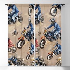 a pair of motorcyclists riding on dirt bikes in the sky blackout curtain