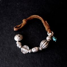 Stamped sterling silver beads Soft tan leather cord Fabric Jewelry, Raw Stone, Leather Lace, Sterling Silver Bead, Leather Cord, Leather And Lace, Silver Beads, Tan Leather, Jewelry Inspiration