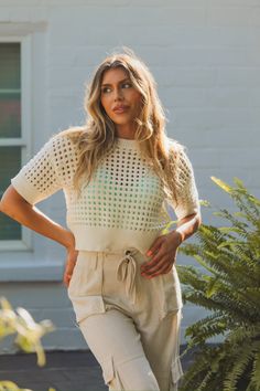 White Crochet Crop Top - Shop Kendry Collection Boutique Trendy Open Knit Crochet Top For Beach, Trendy Summer Crochet Top With Pointelle Knit, Trendy Pointelle Knit Crochet Top For Summer, Beige Hollow Out Summer Top, Beige Hollow Out Tops For Summer, Beige Hollow Out Top For Summer, Summer Vacation Crochet Top With Pointelle Knit, Summer Beach Crochet Top With Pointelle Knit, Summer Knit Hollow Out Tops