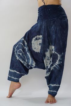 "tiedye Women Yoga Harem Pants - elastic waistband and cuffs - Fits all ! Styles Smock Waist Low Crotch Shipping & Handling * Parcels will be ship via DHL Express Fabric: Light Thai Cotton A light summer cotton with bold tie dye art. Each print is unique so yours may differ in detail, color, and pattern from that pictured but will be similar. From our experience this material can shrink and the colors may run, especially on the first few washes. To reduce shrinkage and color loss follow the Indigo Bohemian Relaxed Fit Bottoms, Tie Dye Cotton Hippie Bottoms, Hippie Tie Dye Cotton Bottoms, Hippie Cotton Tie-dye Bottoms, Tie Dye Cotton Bottoms With Elastic Waistband, Tie Dye Bottoms For Festivals, Hand Dyed Tie Dye Bottoms For Festival, Festival Tie-dye Hand Dyed Bottoms, Festival Tie-dye Hand-dyed Bottoms