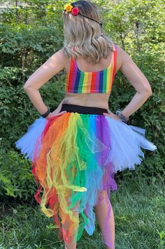 These adorable Tulle tutus are super cute. Adjust size by tying the ribbon closure (there is NO elastic band) and pushing the tulle tighter or spreading it out. I personally have put these on a small child up to a 3-4X person. Shorter in the front with a rainbow tail these are perfect for parties, Halloween, or Pride events.  THESE ARE ONE SIZE FITS MOST. ALL RAINBOW- RAINBOW SKIRT RAINBOW TAIL CLOUD RAINBOW- WHITE SKIRT RAINBOW TAIL SKY RAINBOW- BLUE AND WHITE SKIRT RAINBOW TAIL Bad Wigs, Sky Rainbow, Cloud Rainbow, Rainbow Skirt, Girls Costumes, Bottle Sleeves, Tulle Tutu, Gifts For My Sister, White Skirt