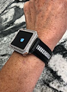 Fits the Apple Watch available for sizes 38,40,42 and 44mm in series 1,2,3,4,5,6 or SE. Look at the back of your watch for Both the correct millimeter size and series. Available to purchase together or individually. (Does not fit the white top ceramic version) This handmade Cz baguette Apple black leather Watch band and or the Bezel has Lab diamond baguette Bezel (can be purchase as a set or just the Crystal band)It is genuine leather and the stones are set in metal prongs and are channeled down Luxury Silver Apple Watch Band, Luxury Bling Watch Accessories For Gift, Luxury Embellished Watch Accessories For Gift, Luxury Silver Watch Bands With Bling, Baguette Band, Rose Gold Apple Watch, Apple Watch Leather, Gold Apple Watch, Diamond Baguette