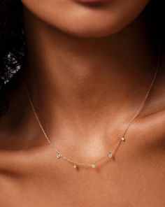 Why We Love It: With this best-selling style, five round-cut diamonds, strung along a delicate gold chain, appear to float against your décolletage. February Jewelry, Jewelry Shoot, Floating Diamond Necklace, Gold Minimalist Jewelry, Delicate Gold Chain, Ring Concierge, Necklace Length Guide, Bracelet Size Chart, Diamond Tennis Necklace