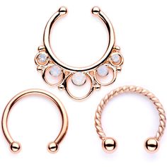 16 Gauge (1.2mm), 3/8" (10mm), Rose Gold Tone Anodized over 316L Surgical Grade Stainless Steel Seamless Clip On Ring, Rose Gold Tone Anodized over 316L Surgical Grade Stainless Steel Horseshoe Circular Barbell, Rose Gold Tone Anodized over Twisted 316L Surgical Grade Stainless Steel Horseshoe Circular Barbell, Faux Opal, No Piercing Required, Sold as a Set of 3 White Faux Opal Rose Gold Tone Twisted Horseshoe Clip On Septum Set Expand your septum jewelry collection with this set of three unique Unique Septum, Rose Gold Septum Ring, Opal Body Jewelry, Septum Piercing Jewelry, Faux Septum, Pregnancy Belly Rings, Horseshoe Jewelry, Septum Rings, Helix Piercing Jewelry