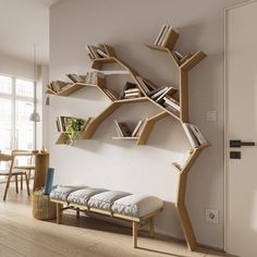 a living room filled with furniture and bookshelves next to a wall mounted book shelf