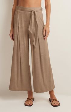 Take your casual look to the next level with the elevated, wide leg Isla Pucker Knit Pant. This pull on style features flattering details that will make this a pant you reach for on repeat. Chic Wide Leg Pull-on Pants For Day Out, Chic Pull-on Style Wide Leg Pants For Loungewear, Chic Wide Leg Loungewear Pants With Pull-on Style, Chic Wide Leg Pants With Pull-on Style For Fall, Fall Wide Leg Pull-on Pants, Wide Leg Pull-on Pants For Day Out, Solid Wide Leg Pants For Day Out In Fall, Solid Wide Leg Pants For Fall Day Out, Wide Leg Solid Color Pants For Fall Day Out