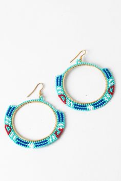 Treat yourself to some major bling without breaking the bank with these Medallion Magic Beaded Hoop Earrings! These golden babies will make you look like a hippie goddess, combining the glamour of the rich & famous with the relaxed vibes of the beach. So affordable, you'll be feeling "hoop-la" over these earrings! Bohemian Hoop Beaded Earrings With Colorful Beads, Bohemian Rainbow Beaded Hoop Earrings, Bohemian Multicolor Beaded Hoop Earrings, Festival Multicolor Beaded Hoop Earrings, Adjustable Colorful Beaded Circle Hoop Earrings, Dyi Earrings, Neon Earrings, Hippie Goddess, Indigenous Crafts