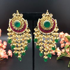 Emerald Chandbali/ Jadau Sabyasachi Chandbali/ Kundan Bridal Earrings/ Green Kundan Chandbali/ Indian wedding Jewelry/ Bridal Chandbali Features Traditional Emerald Chandbalis with pearl beads Handcrafted To Perfection Light Weight earrings Perfect For Indian Weddings And Celebrations A Beautiful & Memorable Gift for Weddings or engagement. Length: 3 Inches Bridal Tilla Earrings For Festive Celebrations, Ceremonial Chandbali Danglers For Diwali, Traditional Chandbali Danglers For Ceremonial Occasions, Traditional Wedding Earrings With Cutdana, Traditional Wedding Danglers With Cutdana, Traditional Danglers With Cutdana For Wedding, Chandbali Bridal Earrings With Tilla For Festivals, Festive Chandbali Bridal Earrings With Tilla, Bridal Chandbali Earrings With Tilla For Festivals