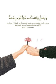 two people are touching each other's hands with a flower in front of them