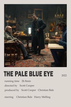 the pale blue eye poster with two men sitting at a table and one man standing