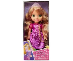 the disney princess doll is in its purple box and has long hair, wearing a tiara