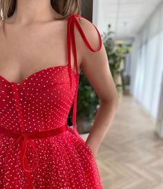 Details: -Dotted tulle fabric -Red scarlet color -Tea length style with decorative straps Prom Dress With Pockets, Teuta Matoshi, Casual Wedding Guest Dresses, Column Wedding Dress, Navy Prom Dresses, Homecoming Dress Short, Beach Wedding Guest Dress, Beach Wedding Dress Boho, Stunning Prom Dresses