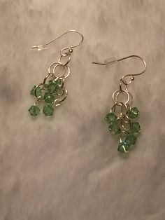 green crystal earrings Round Rock, Green Crystal, Green Crystals, Crystal Earrings, Jewelry Earrings Dangle, Etsy Earrings, Beauty Book, Dangle Drop Earrings, Etsy Accessories