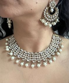 Plz let us know within 24hrs of receiving item if there is any issue with it and post within 7days of delivery. This listing comprises of beautiful Imitation Jewellery Sets! Earring drop is just over 6cm approx. The pic shown is of the real product and you will receive exactly what Is shown in the pic. But plz allow for slight imperfections. So plz buy with confidence 😊 Many thanks for visiting my shop snd hope you could find the perfect set to suit the occasion x Any Questions? Plz Ask ? Jeweled Bridal Necklace For Party, Jeweled Bridal Necklace For Celebration, Glamorous Round Pearl Jewelry, Jeweled Round Bridal Necklace For Party, Party Kundan Necklace With Stone Work, Kundan Necklace With Stone Work For Party, Glamorous Pearl Jewelry With Sparkling Stones, Jewel Wedding Necklace, Round Kundan Metal Necklace For Party