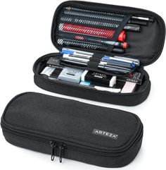 ARTZ-4446 Pencil-Holders, Black All-in-One Pencil Organizer and Bag: This black pencil case features a main compartment with a mesh pocket and 4 slots for pens and pencils. Item Package Dimension: 8.89L x 4.72W x 1.57H inches Item Package Weight - 0.17 Pounds Item Package Quantity - 1 Product Type - CARRIER BAG CASE Compact, Durable Pencil Pouch Design We designed our black pencil case so that you can stay organized all year round. This compact soft pencil case is made of durable polyester fabric. Our pen pouch has one large zipper compartment with a mesh pocket and 4 slots for your pens and pencils. What We Love About Our Arteza Pencil Case: Zipper closure to keep your supplies secure. Mesh inner pocket and 4 pencil and pen slots. Compact and made of durable polyester fabric. Our Arteza G Black Pencil Case, Stationery Obsession, School Bag Essentials, Study Stationery, School Pencils, Writing Utensils, Stationary School, Black Pencil, Essential Bag