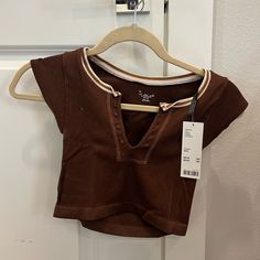 New With Tags Never Worn! Stretchy, Comfortable, Great For Cute Casual Fit Or For Fitness Outfit. Brown. Size S/Xs Ribbed Tops For Gym In Summer, Casual Ribbed Cropped Activewear, Casual Summer Activewear Crop Top, Ribbed Cotton Athleisure Activewear, Ribbed Sports Tops For Spring, Ribbed Sports Tops For Summer, Spring Sports Ribbed Tops, Trendy Sports Tops, Summer Sportswear Crop Top