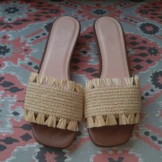 Neutral Colored Raffia Woven Sandals, Approximately 1 In Heel Chic Brown Straw Sandals, Brown Woven Straw Sandals, Brown Straw Flat Sandals, Brown Flat Straw Sandals, Brown Straw Slip-on Sandals, Brown Closed Toe Straw Sandals, Straw Sandals, Raffia Sandals, Woven Sandals