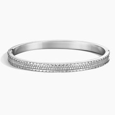 Sol Diamond 7.5 in. Bracelet - 18K White Gold. The rows of pavé diamonds and bright-cut border of this bangle emanate the rays of the sun and wrap you in layers of light (2 1/6 total carat weight). 

 Sol is a collection that invites you to embrace your inner light. By capturing the symbolism of the sun, it encourages the celebration of love, authenticity, and gratitude. Rays Of The Sun, Inner Light, Brilliant Earth, Lipstick Colors, Pave Diamonds, Gratitude, Of Love, The Sun, Jewelry Bracelets