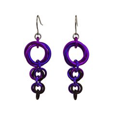 An elegantly tapered "tail" hangs from a knot of 3 rings to create the Comet Earrings in the beautifully goth combination of black and purple. Design measures approx. 1.75" long including earwire. Aluminum links on stainless steel earwire. PURPLE GOTH - violet, purple, black Purple And Black Jewelry, Purple Gothic Jewelry For Formal Occasions, 60s Goth, Purple Gothic Accessories, Purple Gothic Jewelry, Mall Goth Purple, 60s Earrings, Purple Goth, Purple Accessories