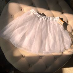 Fabulous White Tutu With Two Layers Of Tulle, Satin, Elastic Belt And Under Skirt Liner Size M New With Tag Stretch Skirt For Spring Costume Party, White Tulle Skirt For Summer, White Non-stretch Party Skirt, Fitted Petticoat For Dress-up Occasions In Spring, White Non-stretch Skirt For Party, White Summer Party Petticoat, White Skirt For Halloween Costume Party, White Skirt For Costume Party In Summer, White Summer Skirt For Costume Party