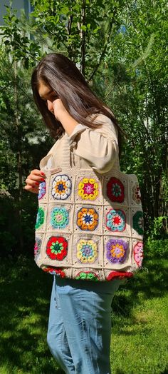 I'm crocheting grandma's knit bags for you. This wonderful floral daisy crochet bag is the perfect accessory for your summer and winter outfit. Summer is so close and the sun is shining everywhere, it's time for summer fashion :) -This awesome crochet bag is the perfect accessory for your summer and winter outfit. - Soft and bright colors in cute granny square. -Crochet bag has enough space for all your belongings :) -Fully handmade crochet after my own design. - The crochet bag is a great gift Multicolor Crochet Yarn Bag, Hand Knitted Rectangular Crochet Bag For Crafting, Bohemian Granny Square Crochet Bag For Crafting, Multicolor Crochet Bag Made Of Yarn, Beige Granny Square Crochet Tote Bag, Beige Square Crochet Bag, Bohemian Beige Crochet Bag With Granny Square, Beige Rectangular Crochet Bag With Granny Square, Rectangular Crochet Bag In Beige With Granny Square