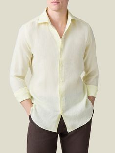 Indulge in the epitome of timeless summer luxury with the Portofino, our signature linen shirt. Featuring our iconic “Paramontura” one-piece collar to create a clean design and lasting shape for an elegant appeal. Meticulously crafted in Bergamo and Brescia, in Northern Italy, by skilled artisans using the finest Italian linen and Australian mother of pearl buttons, finished with rare sartorial details such as the “giglio” stitching.     Available in slim and regular fit options, to provide a ta Luxury Relaxed Fit Summer Shirt, Elegant Formal Linen Tops, Timeless Summer Shirt With Spread Collar, Summer Formal Linen Shirt, Timeless Button-up Summer Shirt, Timeless Button-up Shirt For Summer, Timeless Summer Tops With Spread Collar, Linen Shirt With Concealed Placket, Linen Shirt With Concealed Placket And Spread Collar