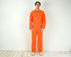 Portwest Vintage Men's S Worker Boilersuit Overalls Jumpsuit Chore Utility Workwear Coverall Orange French Work Workgear Trousers Retro Size: Men's S Condition: Good used condition Colour: Orange (Due to the quality differentiation between different monitors, the picture may not reflect the actual color of the item) Material: 100% Cotton Weight: 920 g SKU: EV24 007 /eb/et/gr Model in pictures usually wears size Medium and is 6ft (180 cm) tall. Measurements: Chest (from armpit to armpit) 22" or 5 Overalls Jumpsuit, Work Overalls, Mens Overalls, Vintage Overalls, Boiler Suit, Mens Bottom, Vintage Men, Work Wear, Overalls