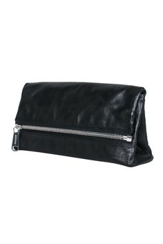 Add the perfect finishing touch to your fabulous outfit with this Joy Gryson leather clutch, designed with a large zipper flap closure and a roomy interior to carry your essentials in style. This captivating accessory pairs well with any outfit for any special occasion, allowing you to exude confidence and grace at any social gathering. 100% Leather Lined Silver-toned hardware Back pocket w/ zipper closure Large zipper front w/ magnetic fold-over closure One interior slide-in pocket One interior Black Clutch Wallet With Zipper Pocket, Modern Clutch Wallet With Zipper Closure, Chic Wallets With Zipper Closure For Everyday, Chic Everyday Wallet With Zipper Closure, Chic Travel Clutch With Zipper Closure, Trendy Clutch With Zipper Closure For Travel, Trendy Travel Clutch With Zipper Closure, Chic Everyday Clutch With Zipper Closure, Black Leather Clutch With Zipper Closure