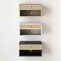 two white shelves with black and brown drawers