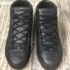 Brand New. Retails Over $600 New. Purchased The Wrong Size. My Mess Up Is Your Gain. Balenciaga Arena High 'Black' 341760 - Eu43. 100% Lambskin Metal Tab With Guillochet Design At Front Quilted Section At Back Tone-On-Tone Laces, Sole And Lining Balenciaga Logo On The Tongue Made In Spain The Item Does Not Come With A Balenciaga Dustbag Or Box. New Condition. No Defects Or Wear On Leather. Bought The Wrong Size. Back Toning, Balenciaga Arena, Shoes Balenciaga, Balenciaga Logo, Balenciaga Black, Balenciaga Shoes, Mess Up, Lambskin Leather, Sneakers Black