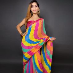 This multicolored saree is prettified with stripes printed and gota work as shown which makes it appear classy. This saree is made of georgette fabric which is accompanied with unstitched banglori silk blouse piece which you can customise as per your design/style. Women can buy this suit to wear for their festive and function. Note:- The actual product may differ slightly in color and design from the one illustrated in the images when compared with computer or mobile screen. Measurements: Saree Bollywood Style Multicolor Pre-draped Saree For Navratri, Bollywood Multicolor Pre-draped Saree For Navratri, Festive Multicolor Pre-draped Saree With Unstitched Blouse, Festive Multicolor Unstitched Pre-draped Saree, Multicolor Pre-draped Saree With Zari Work, Multicolor Pre-draped Saree For Diwali, Multicolor Bandhani Print Pre-draped Saree, Multicolor Traditional Drape Blouse Piece With Bandhani Print, Festive Multicolor Unstitched Blouse Piece