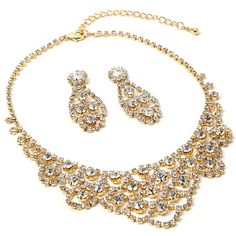 This bridal wedding jewelry set is simply stunning! This beautiful jewelry set is encrusted with clear, sparkling rhinestones in a sophisticated and elegant design. The necklace measures approximately 13" long with a 3" extender Chain for just the right fit. The matching Earrings measure approximately 2" long. This set is perfect for brides, bridesmaids, pageants or any special event. This set coordinates with any color or style wedding dress or formal ensemble. Necklace Matching, Earrings Chandelier, Rhinestone Fashion, Special Necklace, Gold Necklace Designs, Drop Dangle Earrings, Gold Crystal, Wedding Jewelry Sets, Stunning Jewellery