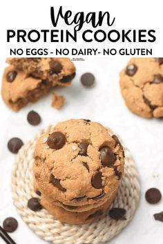 vegan protein cookies are stacked on top of each other with chocolate chips around them