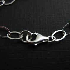 Material: 925 Sterling silver made in Italy. Size: 22 inches The chain size is about 8.5mm long, 6mm wide. Quantity: 1 piece. Model: 601010 For all available lengths of this chain, click here: https://www.etsy.com/listing/96418048 This necklace chain is also available in: Oxidized sterling silver: https://www.etsy.com/listing/485979788 Please convo me for large quantity. Pictures show the shape of the chain, for actual size please read the measurement. ------------------------------------------- Minimalist Oval Jewelry With Silver Chain, Minimalist Oval Silver Chain Jewelry, Silver Oval Cable Chain Jewelry, Oval Silver Jewelry With Cable Chain, Silver Oval Cable Chain Necklace, Oval Sterling Silver Chain Necklace With Adjustable Chain, Silver Oval Necklace With Cable Chain, Oval Sterling Silver Chain Necklace, Oval Silver Chain Jewelry