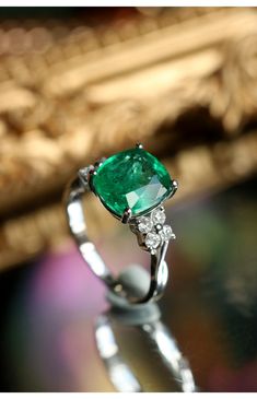 *Condition: Brand new *Center Stone: Natura Emerald from Colombia, Cushion Cut, 3.13ct, 8.3x8mm *Side Stone: Natural White Diamond, approx 0.052ct total (VS1 clarity and F color) *Metal Purity: Can be select Each piece is made-to-order with care and special attention to detail. all items are made with conflict-free diamonds and gems. Size: made to order The item will be gift wrapped and shipped. --------------------------------------------------------- Available in : 14k Rose or Yellow Gold, Whi White Cubic Zirconia Emerald Ring Fine Jewelry, Polished Finish Green Emerald Ring, Zambia Emerald Ring, Luxury Emerald Ring In White Gold With Polished Finish, Emerald Ring Wedding, Emerald-cut Green Cubic Zirconia Cluster Ring, Ballerina Ring, Buying An Engagement Ring, White Gold Engagement