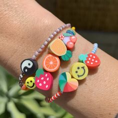 blue, white and red patterned seed bead bracelet with a strawberry, smiley face and heart bead Fruit Beads, Yellow Smiley Face, Seed Bead Bracelet, Seed Bead Bracelets, Bead Stringing, Heart Beads, Colorful Heart, Roll On, Tiffany Heart