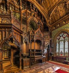 an ornately decorated room with stained glass windows