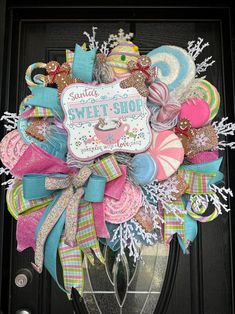 a wreath that is on the front door for someone's sweet shop ornament