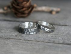 These beautiful organic bands are made of sterling silver which has been hammered and given a dark antique or a satin silver finish. Very comfortable to wear with a unique handmade rustic look, ideal as an every day ring or as wedding or couple rings.  You can choose the 3mm, 5mm or 8mm width for your ring or the bands set you prefer. If you prefer a different finish for your ring(s), please let me know in a message. All our jewelry is made in our studio by hand and we use only traditional silve Rustic Silver Jewelry For Wedding, Rustic Hand Forged Wedding Rings, Rustic Hand Forged Rings For Anniversary, Rustic Silver Wedding Rings, Rustic Hand Forged Promise Ring, Rustic Hand Forged Silver Rings, Rustic Sterling Silver Rings For Anniversary, Rustic Sterling Silver Jewelry For Anniversary, Rustic Silver Promise Ring